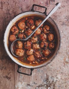 Game meatballs in bean & red wine sauce